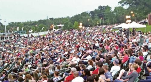 a full audience at the Cascades Park amphitheater during a Southern Shakespeare Company performance